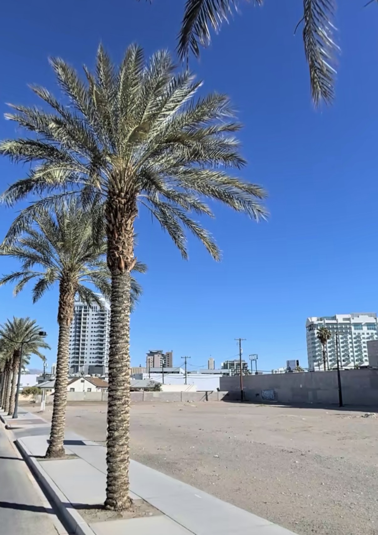 Undeveloped downtown lot against the Las Vegas skyline